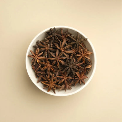 Whole star anise buds showing premium quality and rich aroma, perfect for Indian cooking